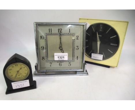 Art Deco style chrome cased mantel clock with silvered dial, a Smiths table clock and a small ebony cased lancet mantel clock
