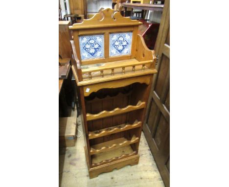 Stripped pine wine rack with tile inset back
