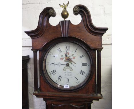 George III oak and mahogany banded longcase clock, the hood with swan neck pediment above shaped door, the circular enamel di