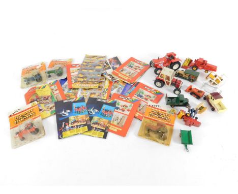 ERTL die cast models of tractors, further tractors and die cast farm machinery, Britains and other toy catalogues. (qty)