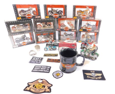 Eleven Maisto die cast models of Harley Davidson motorcycles, scale 1:18, boxed, together with further models of motorbikes a