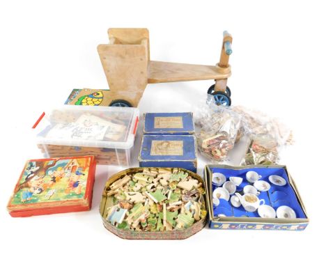 Games and toys, including two Cotswood wooden jigsaw puzzles, child's porcelain tea service, Bilofix, and sundries. (qty)