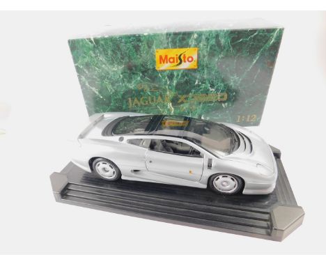 A Maisto die cast model of a Jaguar XJ220 1992, scale 1:12, boxed.