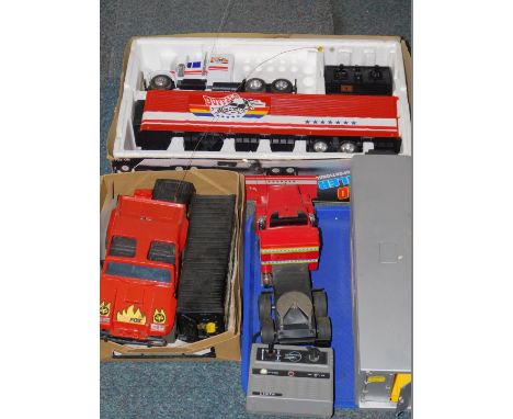 A Daishou radio controlled Buffalo Trailer, scale 1:30, boxed. a Liklo radio controlled Ray May transport, B3944, a Shinsei r