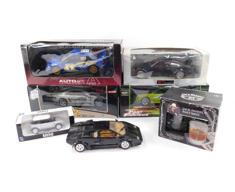 Die cast racing and sports cars, some boxed, comprising an American Muscle 1995 Mitsubishi Eclipse, scale 1:18, Maisto Merced