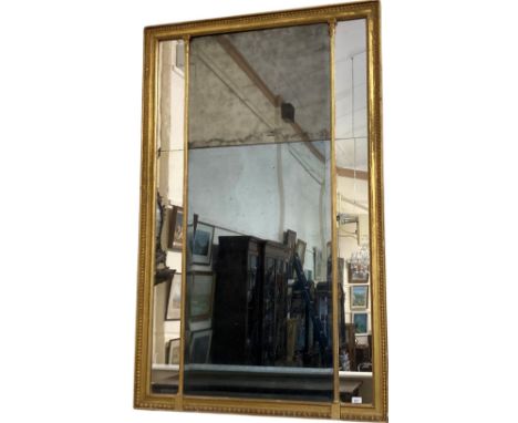 A George III giltwood compartmental upright Wall Mirror, c. 1800, with central divided rectangular plate, flanked by marginal