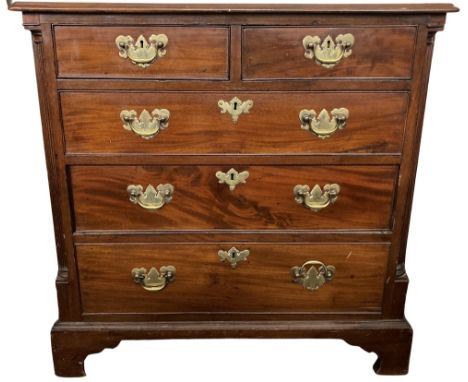 A very fine quality George III style mahogany Chest, of small proportions, with three long and two short drawers flanked to e
