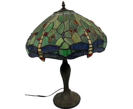 A "Tiffany" style stained glass shade Table Lamp, with dragonfly design, on moulded metal base. (1) 