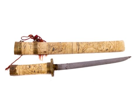 A Japanese carved bone Tanto Dagger, with a single edged slightly curved steel blade with brass mounted bone grip and scabbar