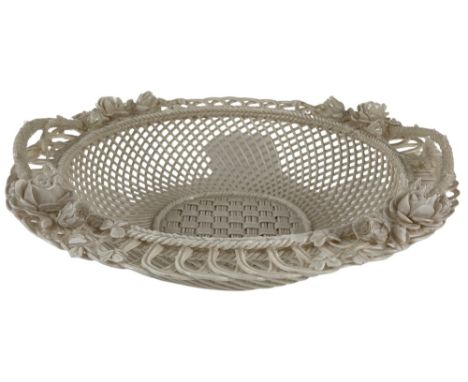 A very good flower encrusted Belleek Basket /Fruit Bowl, with four strand base with two strap marks, Belleek (R) Fermanagh, 2