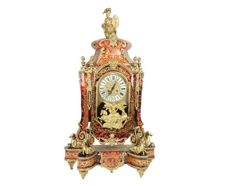 A very large Louis XV style faux boulle Bracket Clock, with fixed bracket, the Italian case surmounted by a classical female 