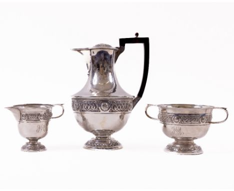 A quality early 20th Century Celtic Revival Irish silver Tea Service, comprising tea, coffee, kettle, cream and sugar bowl, e