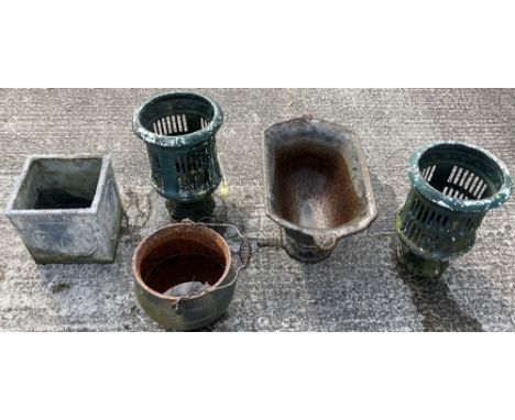 A pair of pierced and green painted metal Garden Urns, 39cms (15"); a large rectangular cast metal boat shaped Planter, with 