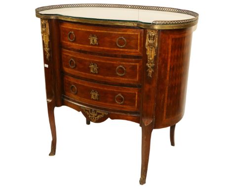 A good French Traditional style kidney shaped parquetry inlaid Commode, with thee quarter pierced brass gallery and brass mou