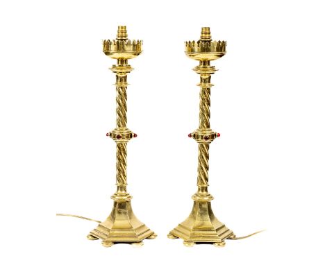 A good pair of brass Altar Candlesticks, each converted as a Table Lamp with two stage spiral reeded stem on octagonal flared