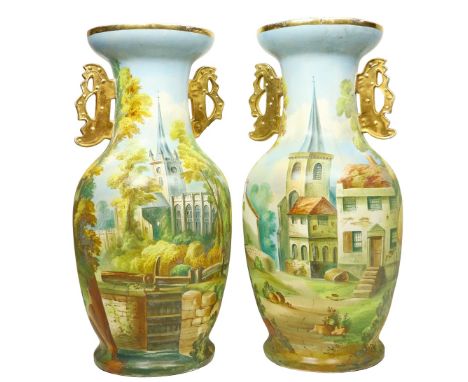 A very large pair of late 19th Century ceramic Vases, decorated in the Abruzzo manner, one with Village Church and the other 