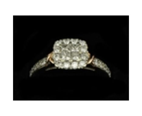 An attractive Ladies engagement Ring, set in 9ct gold (approx. 2.7 gms), with 24 round diamonds of halo design, approx. (.36c