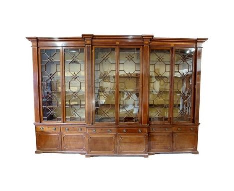 A fine quality and monumental 19th Century breakfront&nbsp;inlaid Bookcase, the cornice with chequered inlay and oval floral 