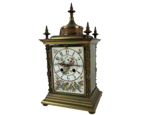 A French brass Mantle Clock, in the Indian style, the movement by Japy Freres, striking on a gong, the centre dome with an ur