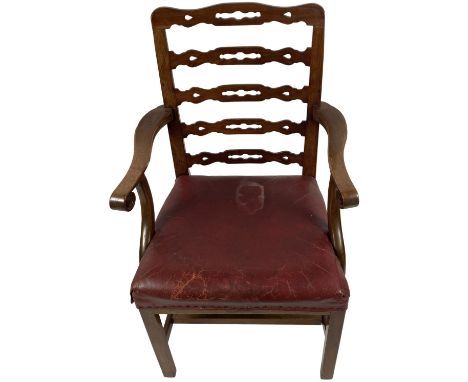 A 19th Century mahogany&nbsp;framed Carver Armchair, the pierced ladder back issuing scroll arms, above red hide seat on squa