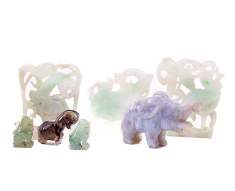 Three small pierced green jade Bird Pendants, approx. 6cms (2 1/2"), a small jade Elephant, a pair of very small Foo Loins. (