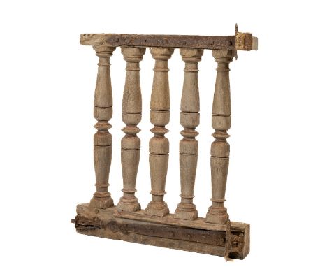 A late 17th Century oak Altar Balustrade Gate, with five sections, each nicely turned with long heavy iron strap work hinges,