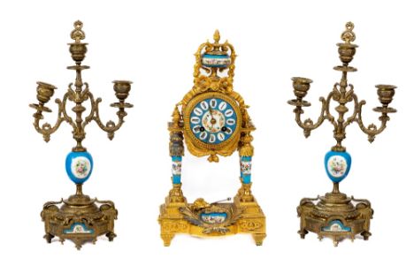 A late 19th Century gilt metal and porcelain&nbsp;rounded French Mantel Clock Garniture, the movement by Japy Freres, strikin