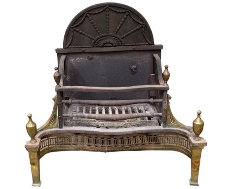 A 19th Century brass and steel Fire Grate, the sunburst design back over a shaped basket, with pierced brass and finial mount