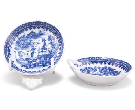 TWO CAUGHLEY EGG DRAINERS, CIRCA 1785 TWO CAUGHLEY EGG DRAINERS, CIRCA 1785, the first with shell-form handle, the second wit