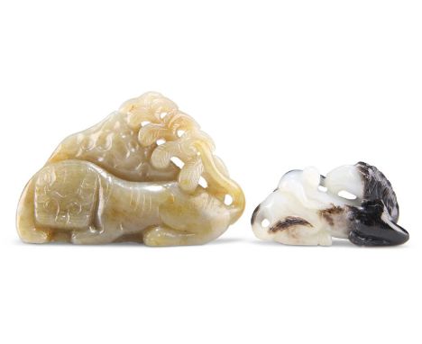TWO JADE CARVINGS A JADE CARVING OF A TIGER BENEATH A TREE, 6cm by 9cm by 2cm; and A JADE CARVING OF A MONKEY AND A RECUMBENT