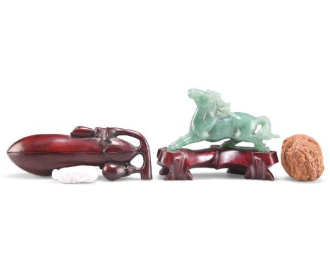 A GROUP OF CHINESE ITEMS A GROUP OF CHINESE ITEMS, comprising a carved walnut depicting figures, a cicada carved jade pendant