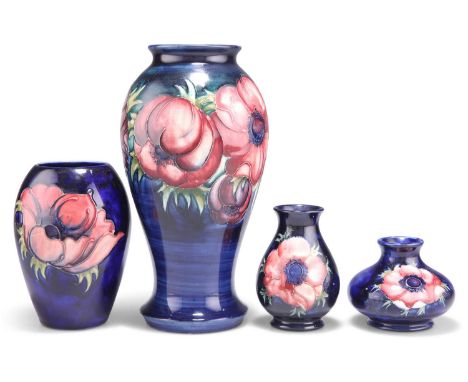 FOUR WALTER MOORCROFT ANEMONE PATTERN TUBE LINED POTTERY VASES FOUR WALTER MOORCROFT ANEMONE PATTERN TUBE LINED POTTERY VASES