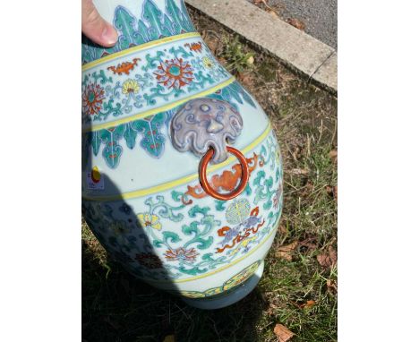 A LARGE CHINESE DOUCAI VASE A LARGE CHINESE DOUCAI VASE, ovoid, enamel painted with scrolling tendrils, mon and fish, between