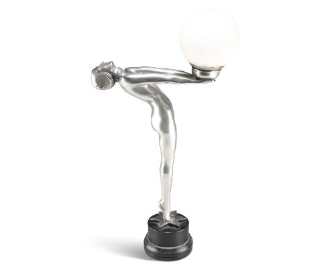 AN ART DECO STYLE PATINATED FIGURAL TABLE LAMP AN ART DECO STYLE PATINATED FIGURAL TABLE LAMP, the sinuous figure modelled ho