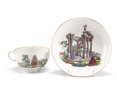 A WORCESTER PORCELAIN 'EUROPEAN RUINS' TEACUP AND SAUCER, CIRCA 1765 A WORCESTER PORCELAIN 'EUROPEAN RUINS' TEACUP AND SAUCER