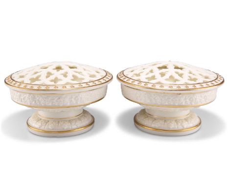 A PAIR OF GRAINGER &amp; CO WORCESTER RETICULATED AND GILDED POT POURRI VASES AND COVERS A PAIR OF GRAINGER &amp; CO WORCESTE