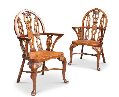 A PAIR OF GOTHIC STYLE HARDWOOD WINDSOR ARMCHAIRS A PAIR OF GOTHIC STYLE HARDWOOD WINDSOR ARMCHAIRS, each with an architectur