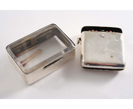 AN EDWARDIAN "PATENT" VESTA CASE with a button thumbpress which elevates the matches on opening (to ease selection), suspenso