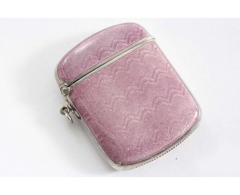 A NORWEGIAN VESTA CASE of rounded oblong form, decorated with translucent lilac coloured enamel over an engine-turned ground,