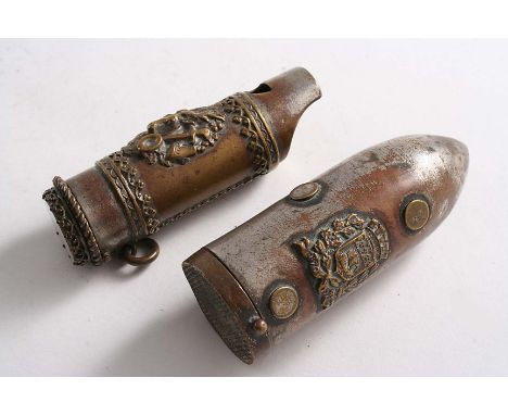 A LATE 19TH CENTURY FRENCH PLATED BRASS VESTA CASE in the form of a howitzer shell with applied coat of arms and a plated whi