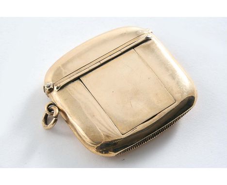 AN EDWARDIAN 9 CT. GOLD VESTA CASE with a hinged flap on the front, revealing a hidden miniature photograph frame, the revers