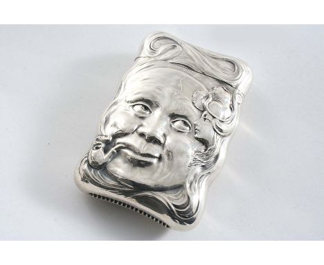 AN AMERICAN VESTA CASE stamped on both sides with the masks of a pipe-smoking gentleman & a pretty young girl, gilt interior 