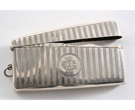 AN UNUSUAL COMBINED VESTA CASE, CARD CASE & STAMP CASE of narrow oblong form with engine-turning, curved to fit the pocket, w