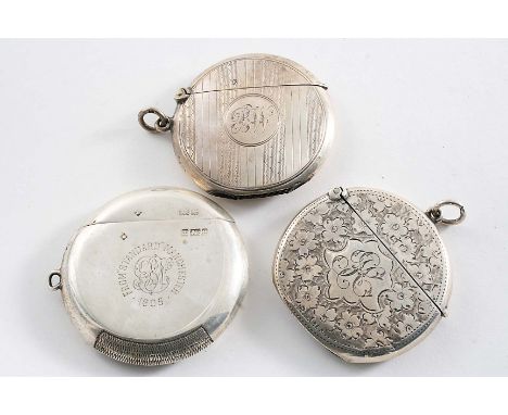 AN EDWARDIAN ENGRAVED CIRCULAR VESTA CASE initialled, suspensory ring, by Lewis Hart, Birmingham 1909, a similar vesta case w