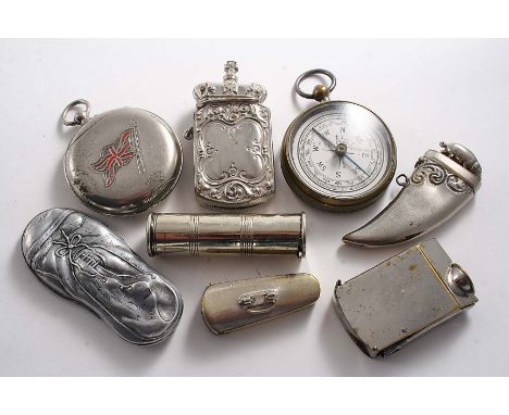 SIX VARIOUS NICKEL-PLATED VESTA CASES, a brass vesta in the form of a compass and an alluminium vesta resembling an old crump
