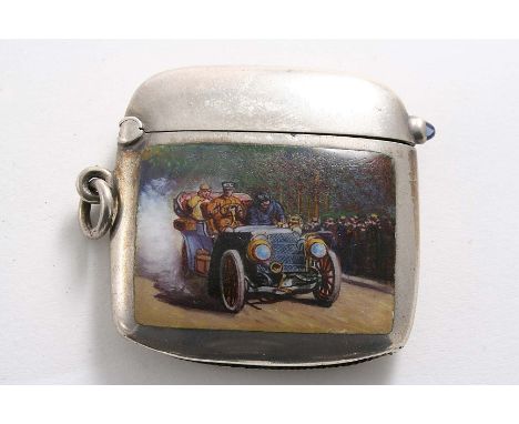 AN EARLY 20TH CENTURY CONTINENTAL VESTA CASE of rounded oblong form with gem-set thumbpiece & suspensory ring, enamelled with