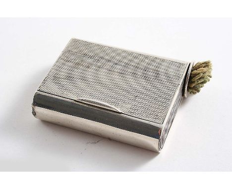 A VESTA CASE AND SPARK STRIKER COMBINED of rounded oblong form with an engine-turned base & cover & concealed hinge, the pull