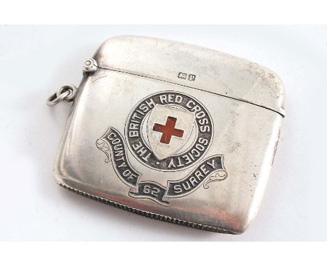 A SLIM VESTA CASE enamelled with the badge of the "British Red Cross Society County of Surrey 62", the reverse initialled "JO