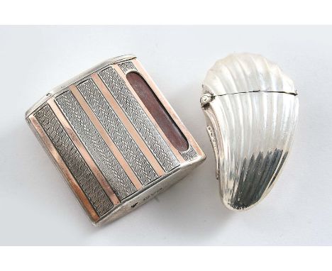 A VICTORIAN VESTA CASE in the form of a fluted mussel shell, maker's mark partially unclear, Birmingham 1887 and an Art Deco 
