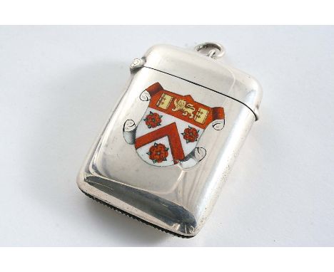 A LATE VICTORIAN VESTA CASE enamelled on the front with the arms of Trinity College, Cambridge, the reverse initialled, suspe